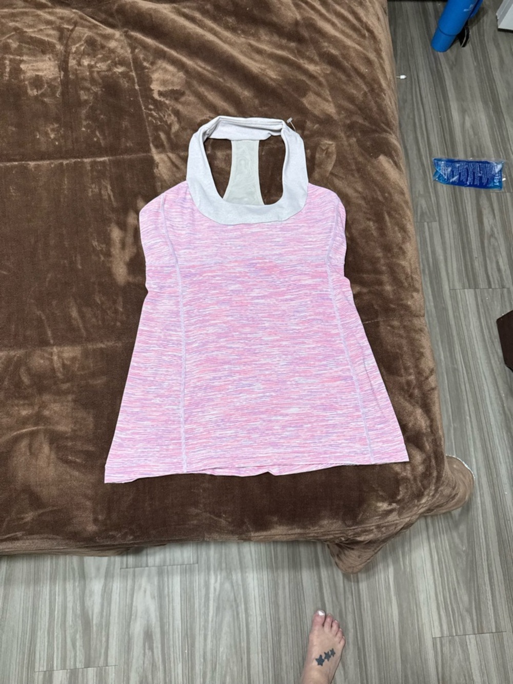Woman’s size 8 Lululemon  Pink Heathered Racerback Tank with Light